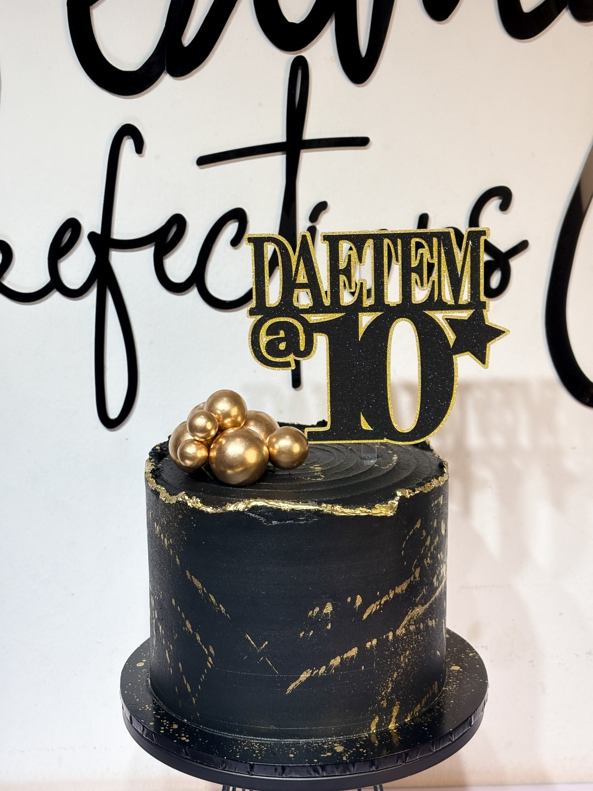 Black and gold cake